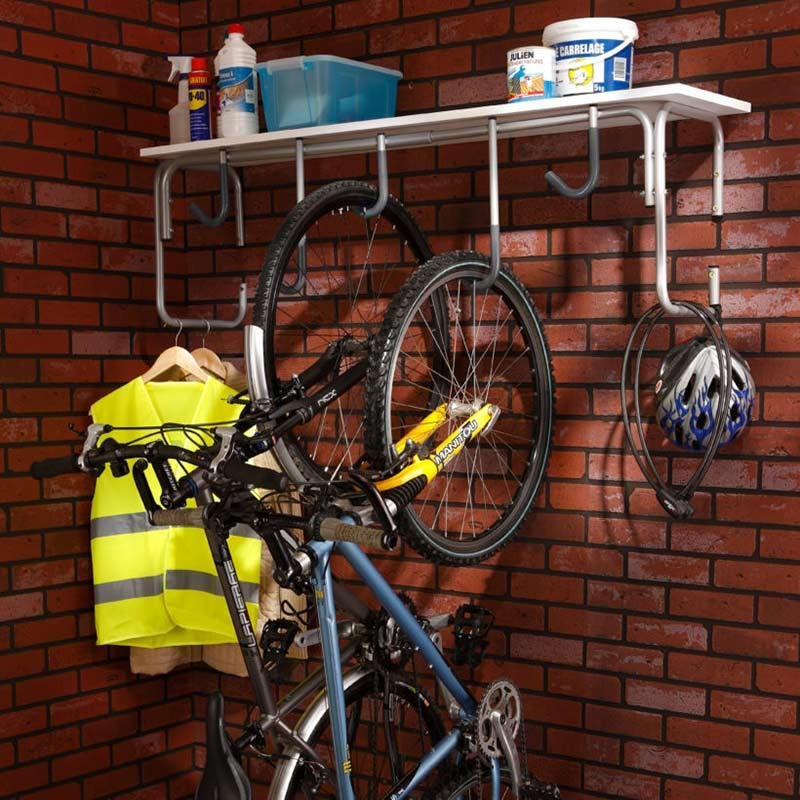 Une barrière pour vélo, en acier zinguée. À fixer au sol sur
