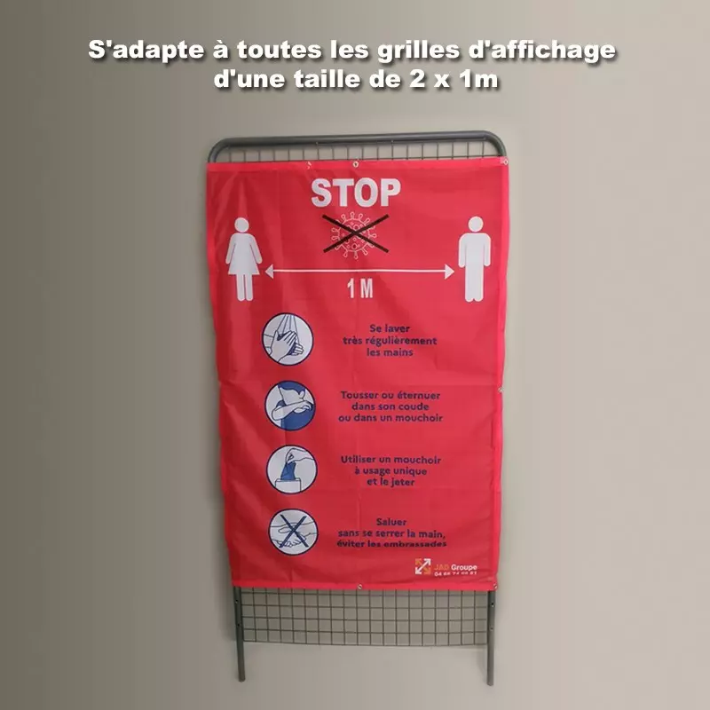 Une affiche en tissu rappelant les gestes barrières sécurité Covid 19